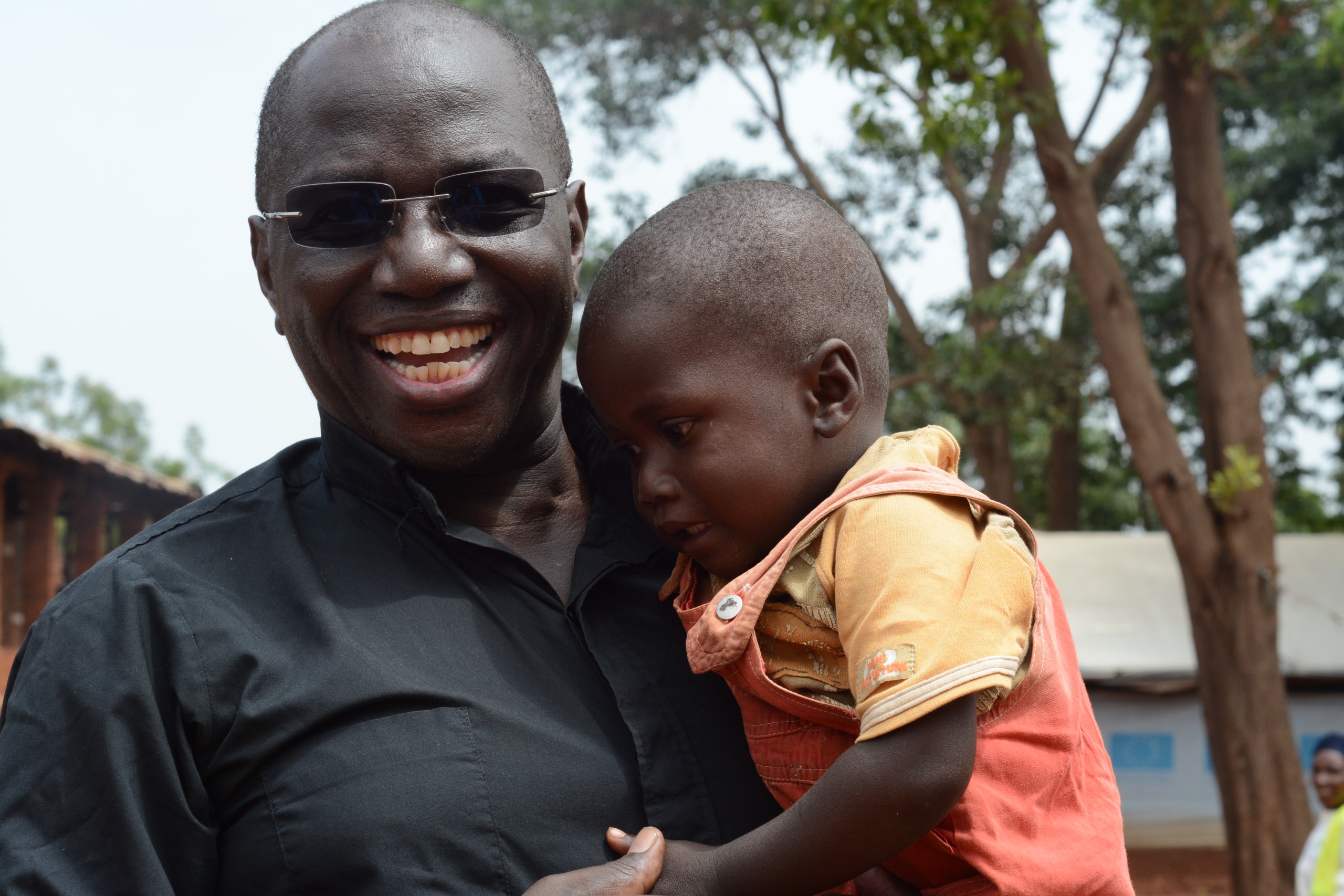 Father Ruffino Ezama visiting Moyo's Baby Home in Uganda.