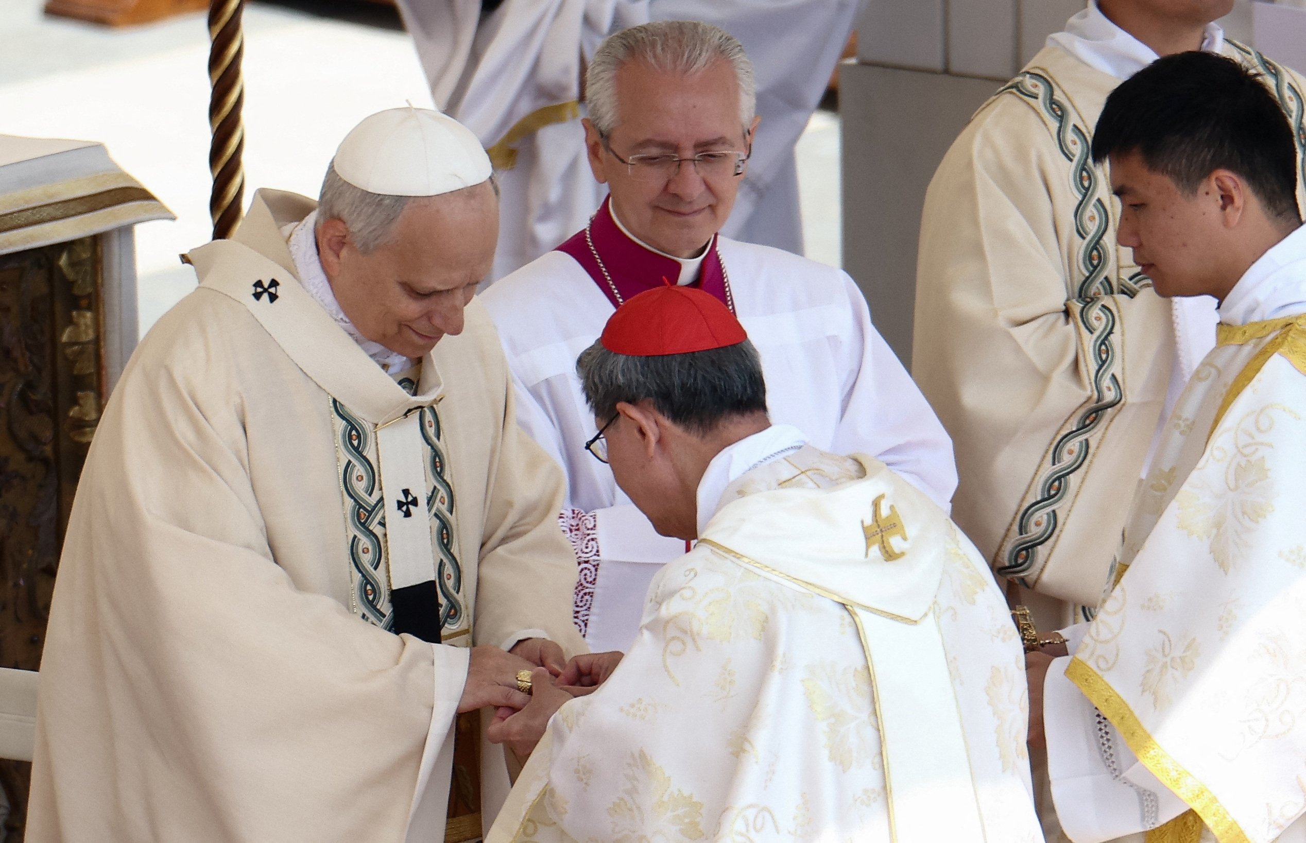 Cardinal Luis Antonio Tagle, pro-prefect of the Dicastery for Evangelization under Pope Francis, places the papal fisherman's ring on Pope Leo XIV, as the pontiff celebrates his inauguration Mass at the Vatican May 18, 2025. He is the first American pope in history. (OSV News photo/Guglielmo Mangiapane, Reuters)
